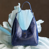 Cowboy Blue | Structured hobo shoulder bag with adjustable strap and magnetic closure