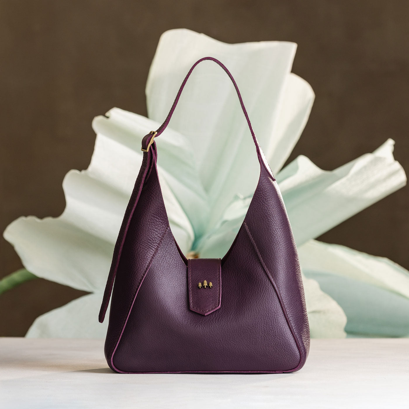 Plum | Structured hobo shoulder bag with adjustable strap and magnetic closure