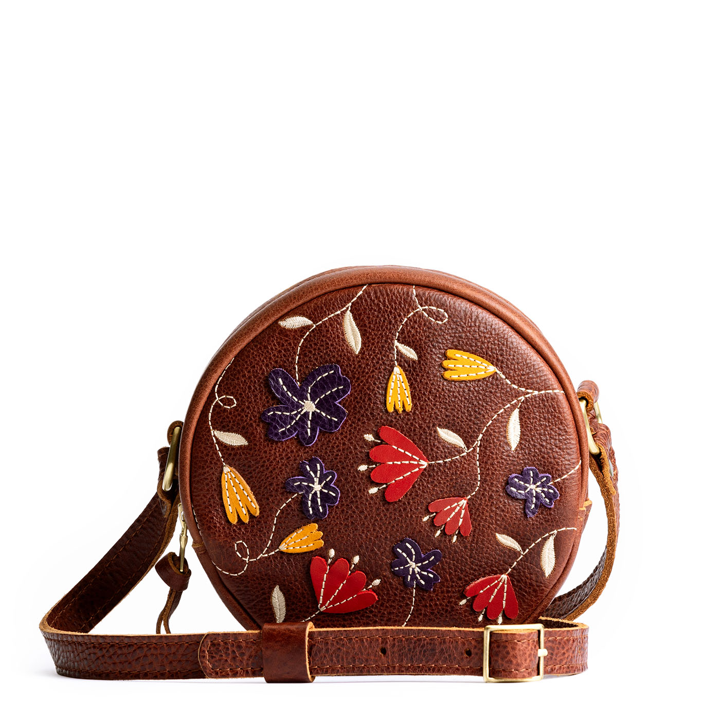 Folklore Nutmeg*Small | Circle shaped crossbody bag with embroidered flower design