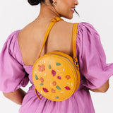 Folklore Sunflower Large | Circle shaped crossbody bag with embroidered flower design