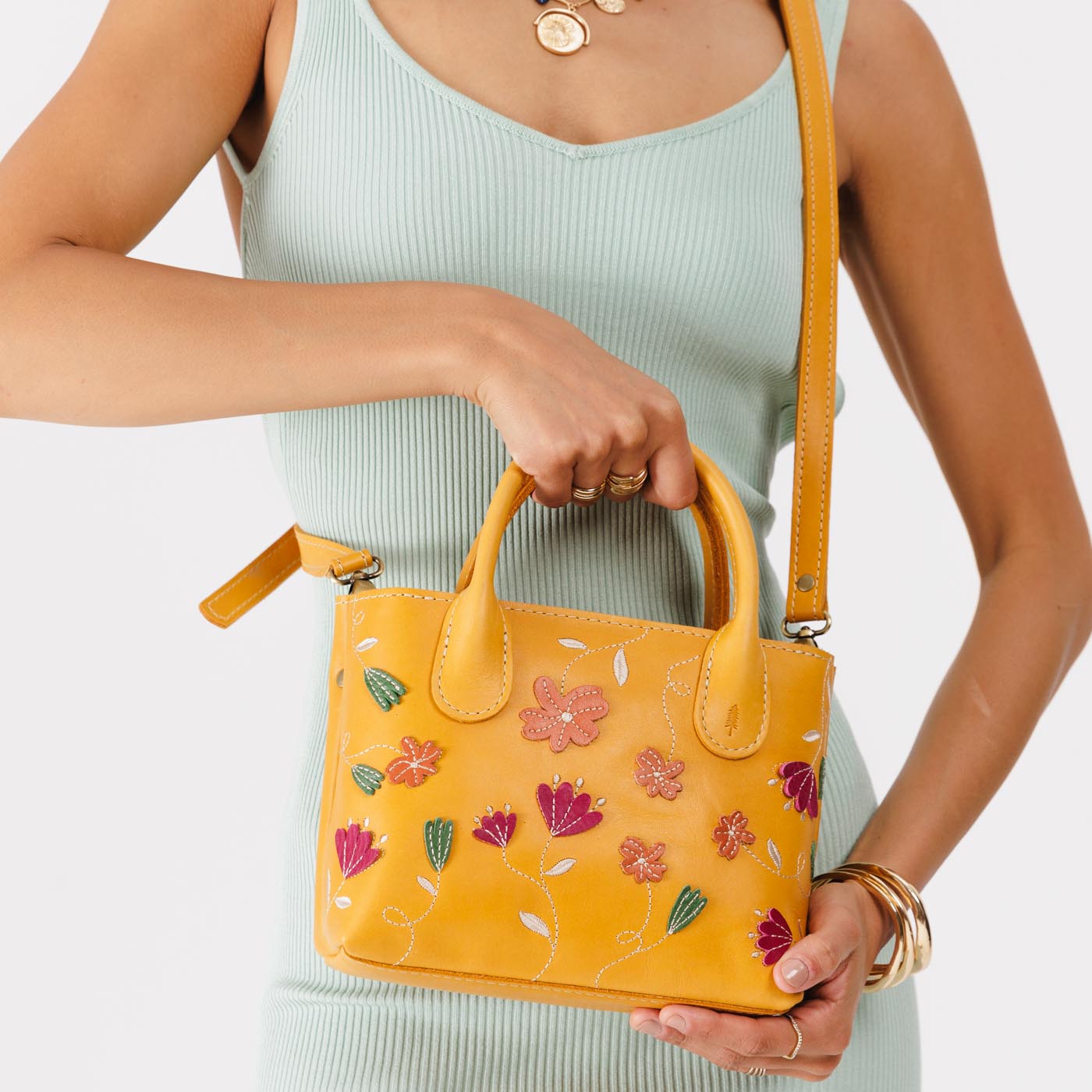 Folklore Sunflower*Small | Petite tote purse with embroidered flower design, structured leather handles, and crossbody strap