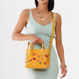 Folklore Sunflower Small | Petite tote purse with embroidered flower design, structured leather handles, and crossbody strap