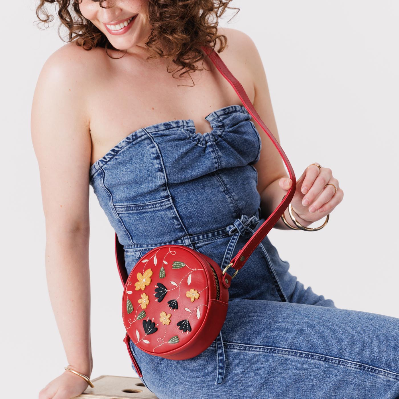 Folklore Ruby*Small | Circle shaped crossbody bag with embroidered flower design