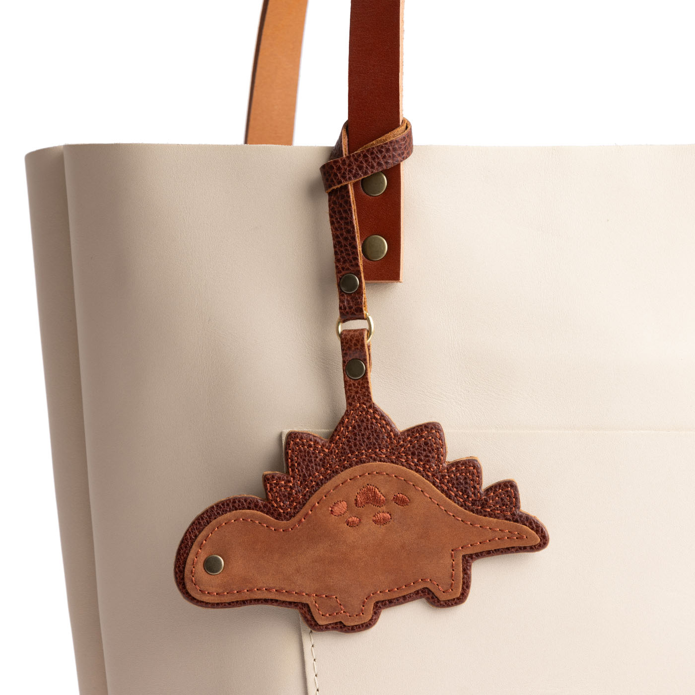 Dakota | Stegosaurus shaped leather tassel