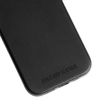 Black | Close up exterior IPhone case with signature Portland Leather logo