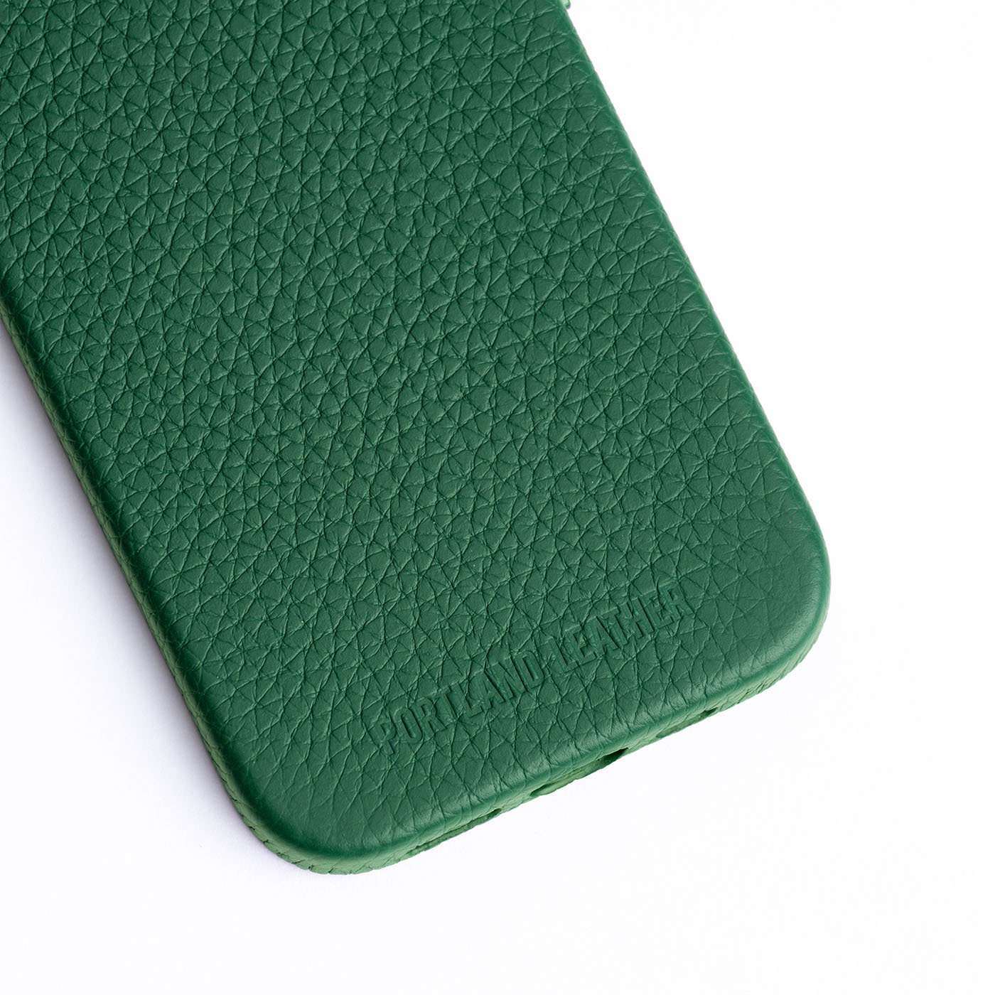 Rainforest  | Close up exterior IPhone case with signature Portland Leather logo
