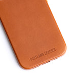 Sienna  | Close up exterior IPhone case with signature Portland Leather logo