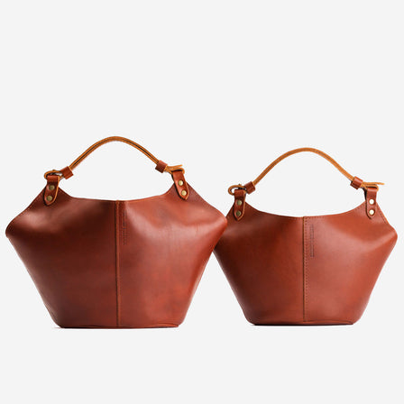 Chestnut*Small | Structured bucket shaped handbag with an adjustable shoulder strap