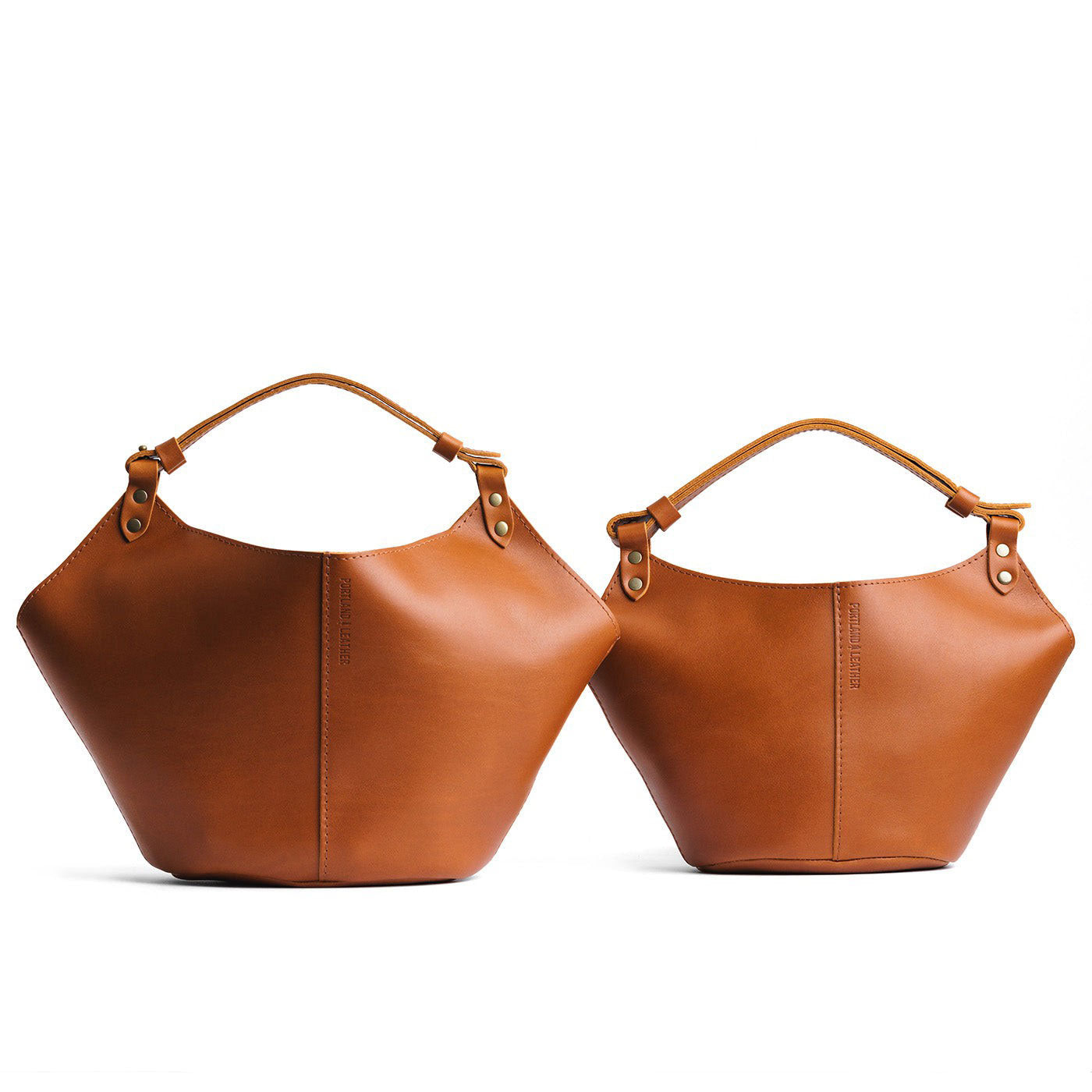 Honey | Structured bucket shaped handbag with an adjustable shoulder strap