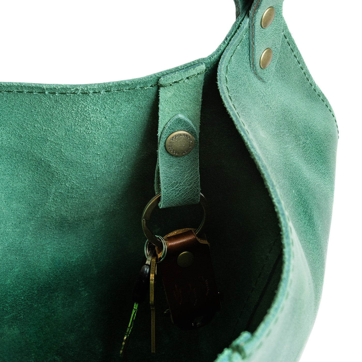 Surf | Structured bucket shaped handbag with an adjustable shoulder strap