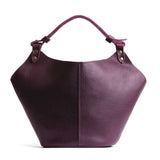 Plum Large | Structured bucket shaped handbag with an adjustable shoulder strap