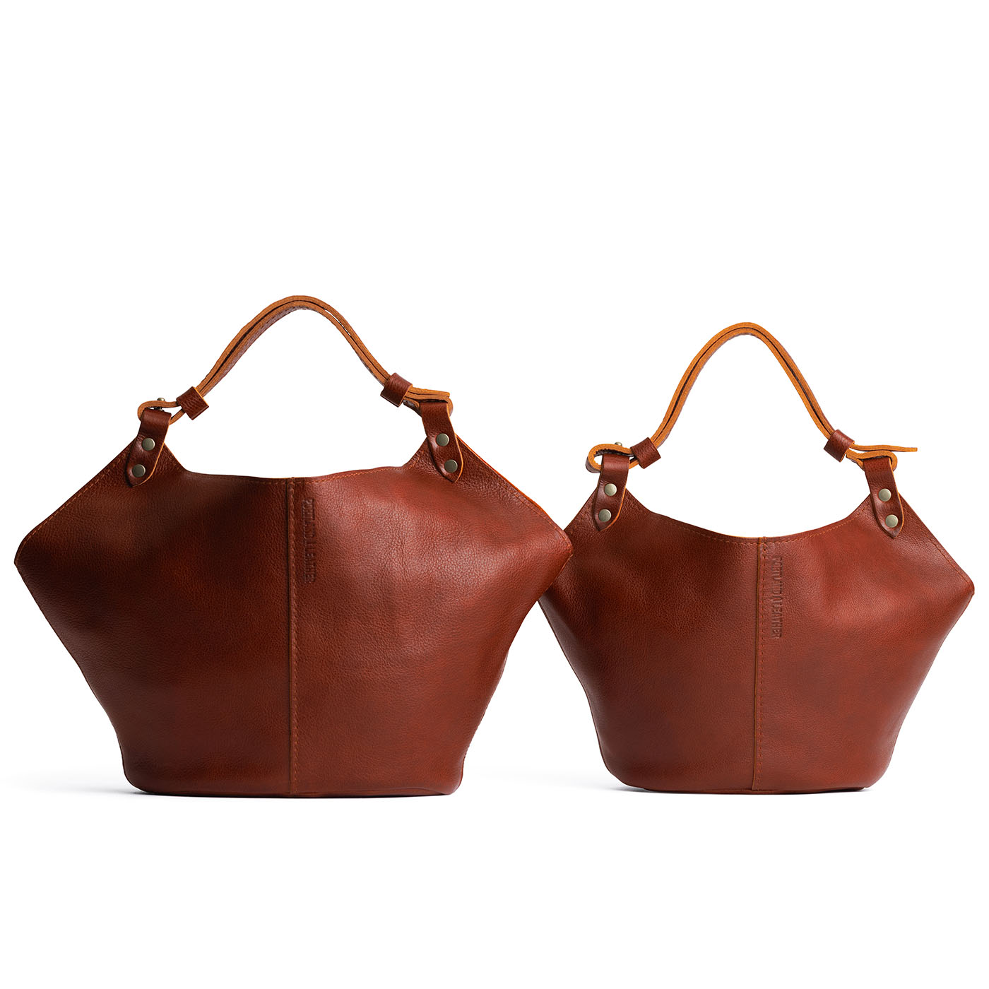 Nutmeg | Structured bucket shaped handbag with an adjustable shoulder strap