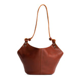 Nutmeg Small | Structured bucket shaped handbag with an adjustable shoulder strap