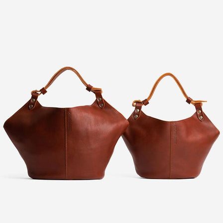 Nutmeg*Small | Structured bucket shaped handbag with an adjustable shoulder strap