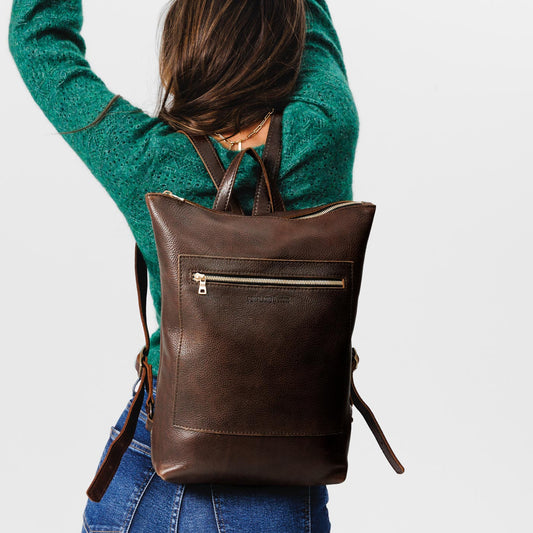 All Color: Coldbrew | Model wearing rectangular slim leather backpack