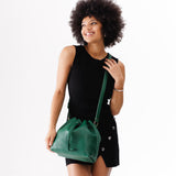 Bacalar Large | Model wearing slouchy crossbody bag with drawstring closure