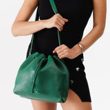 Bacalar Large | Model wearing slouchy crossbody bag with drawstring closure