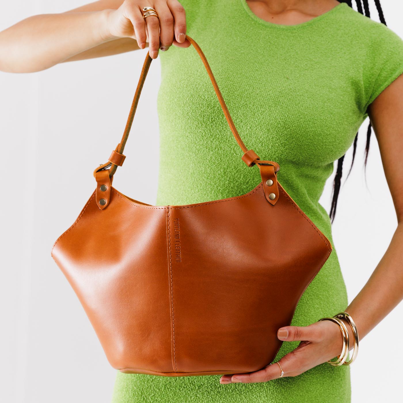 Honey*Large | Structured bucket shaped handbag with an adjustable shoulder strap