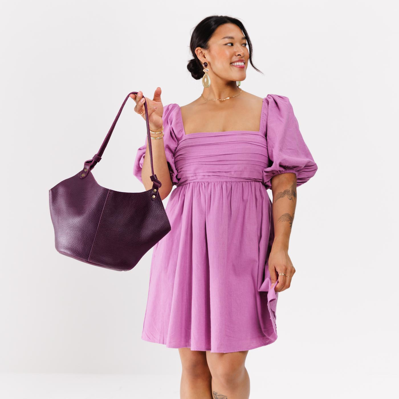 Plum*Large | Structured bucket shaped handbag with an adjustable shoulder strap