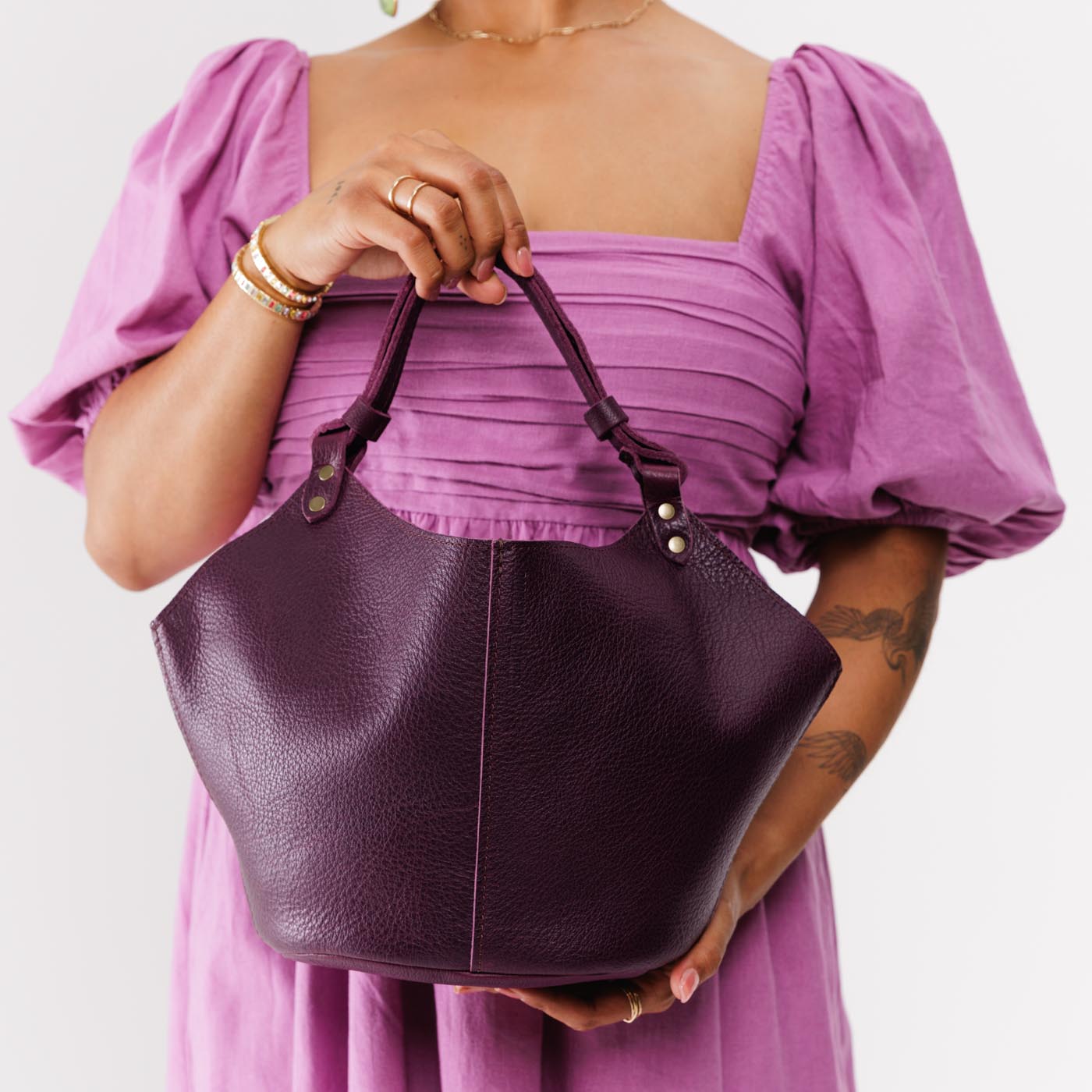 Plum*Large | Structured bucket shaped handbag with an adjustable shoulder strap