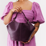 Plum Large | Structured bucket shaped handbag with an adjustable shoulder strap