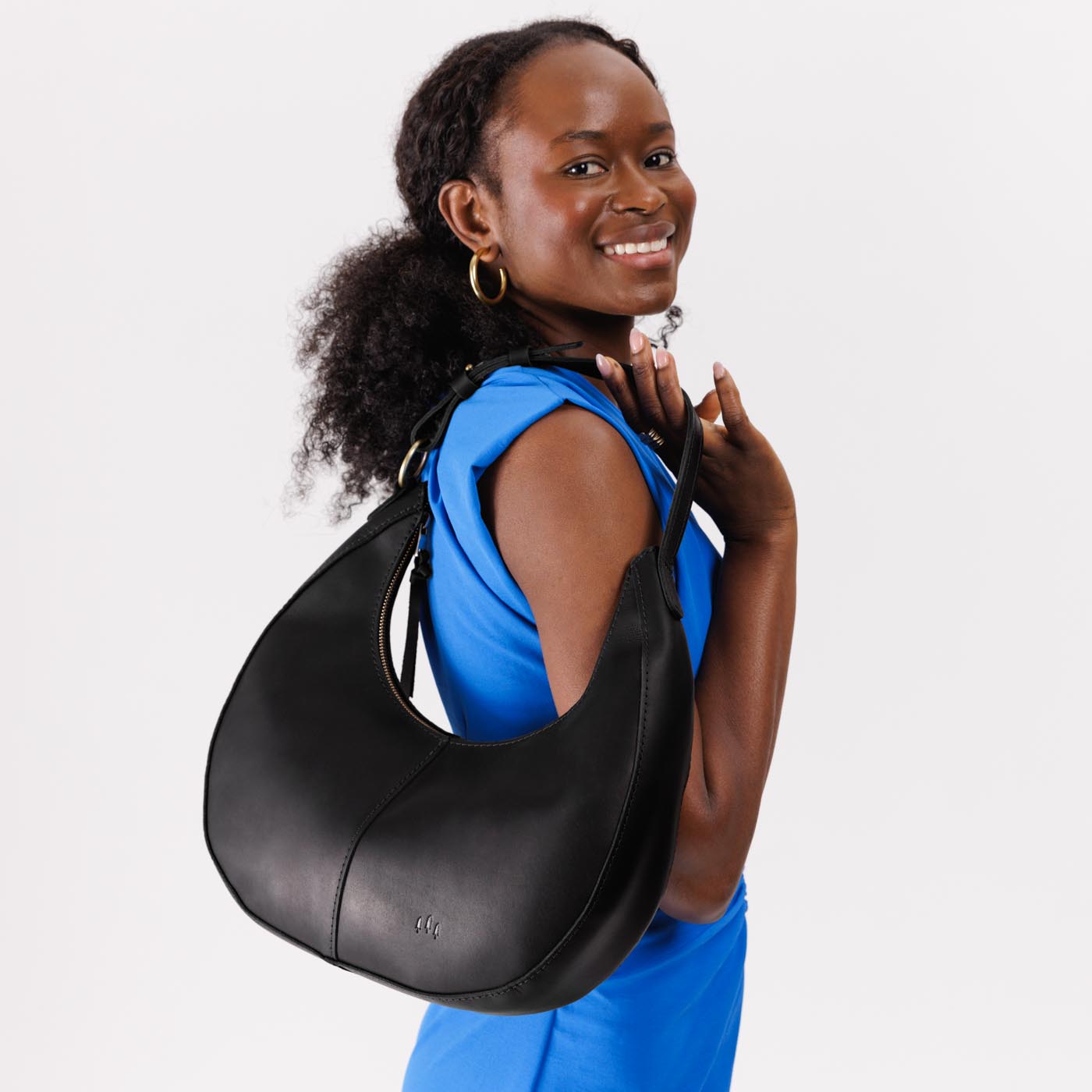 Black*Large  | Large crescent shaped shoulder bag with zipper closure and adjustable strap