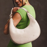 Dragon Bone Large  | Large crescent shaped shoulder bag with zipper closure and adjustable strap