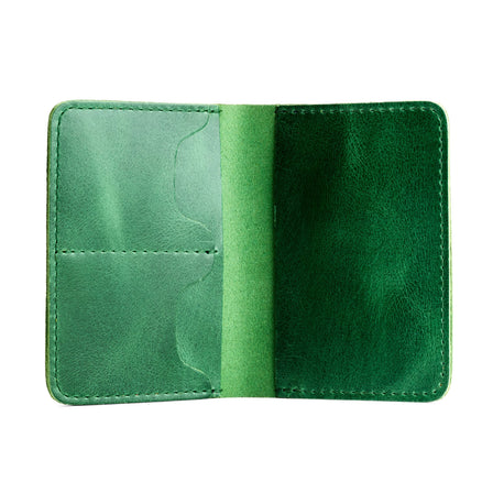 Cowboy Mint | Leather passport case with PLG logo open