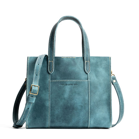 Aqua*Zipper | Structured mid-size tote bag with overlapping panels and crossbody strap