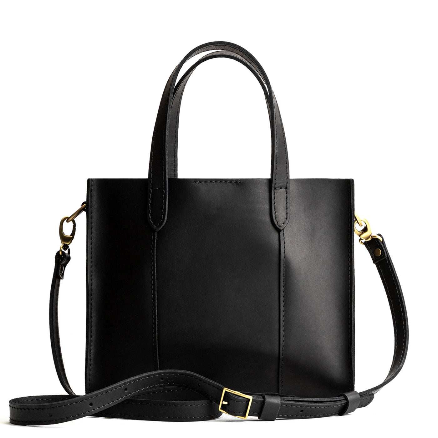 Black*Classic | Structured mid-size tote bag with overlapping panels and crossbody strap