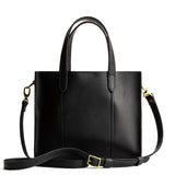 Black Classic | Structured mid-size tote bag with overlapping panels and crossbody strap