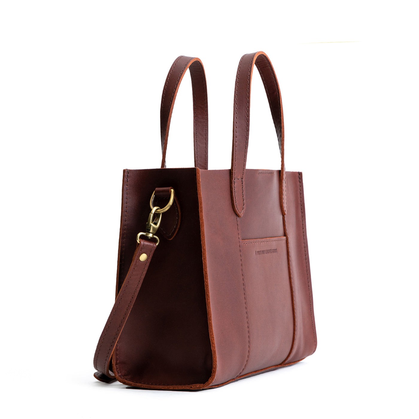 Cognac*Classic | Structured mid-size tote bag with overlapping panels and crossbody strap