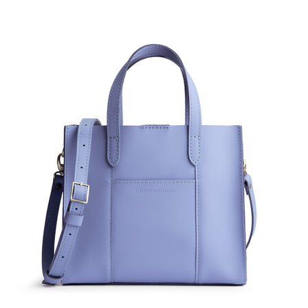 Jacaranda*Zipper | Structured mid-size tote bag with overlapping panels and crossbody strap