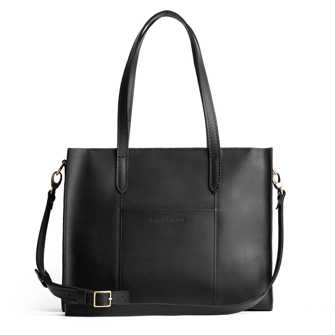 Black*East/West | Structured wide tote bag with overlapping panels and crossbody strap