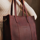  Merlot North/South | Structured large tote bag with overlapping panels and crossbody strap