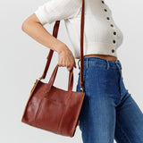 Nutmeg | Structured mid-size tote bag with overlapping panels and crossbody strap