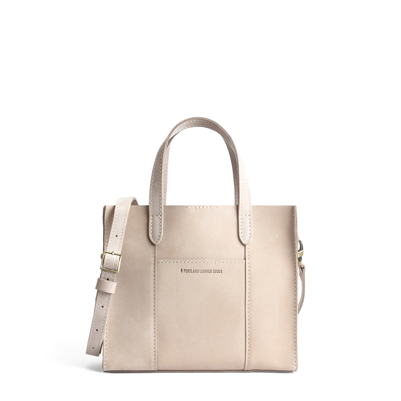Dragon Bone | Structured mid-size tote bag with overlapping panels and crossbody strap