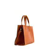 Honey Zipper | Structured mid-size tote bag with overlapping panels and crossbody strap