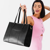 Black East/West | Structured wide tote bag with overlapping panels and crossbody strap