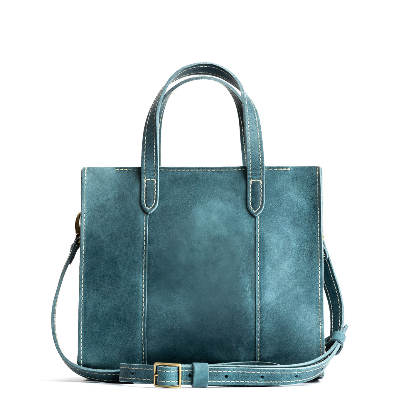 Aqua*Zipper | Structured mid-size tote bag with overlapping panels and crossbody strap