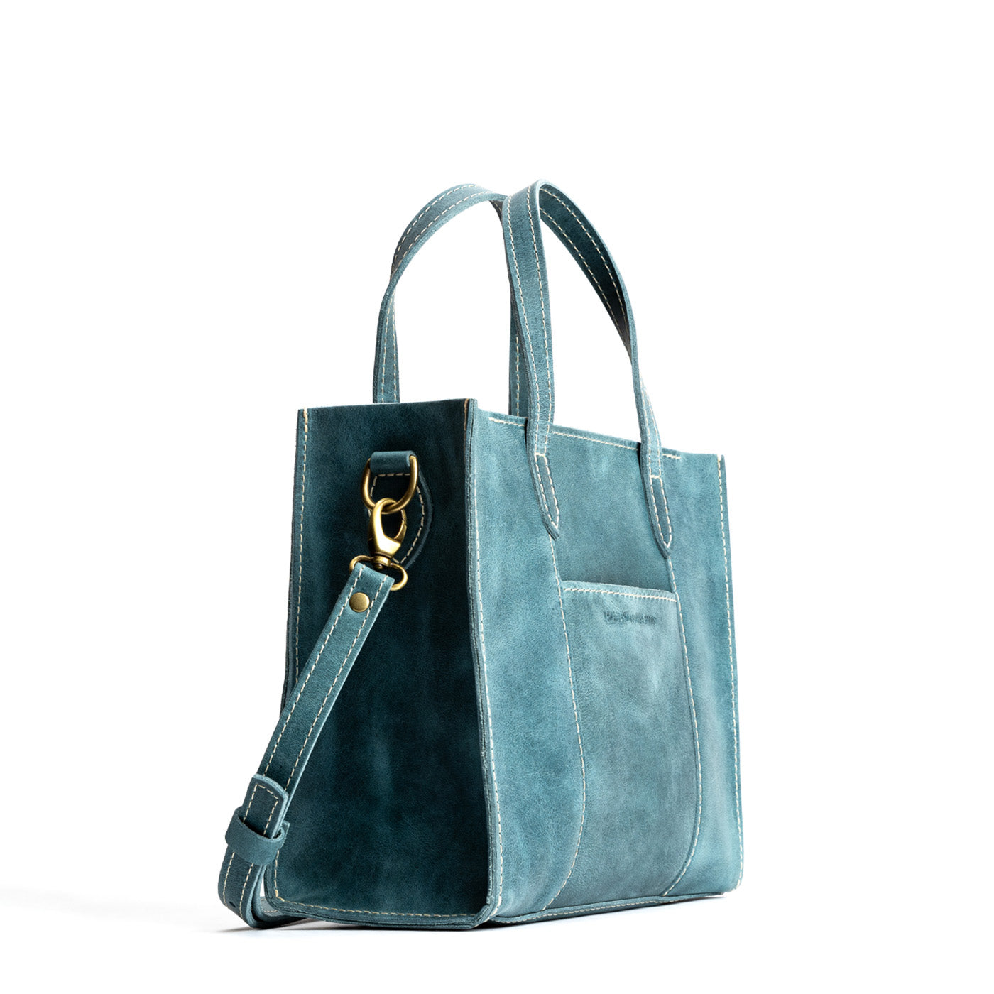 Aqua*Zipper | Structured mid-size tote bag with overlapping panels and crossbody strap