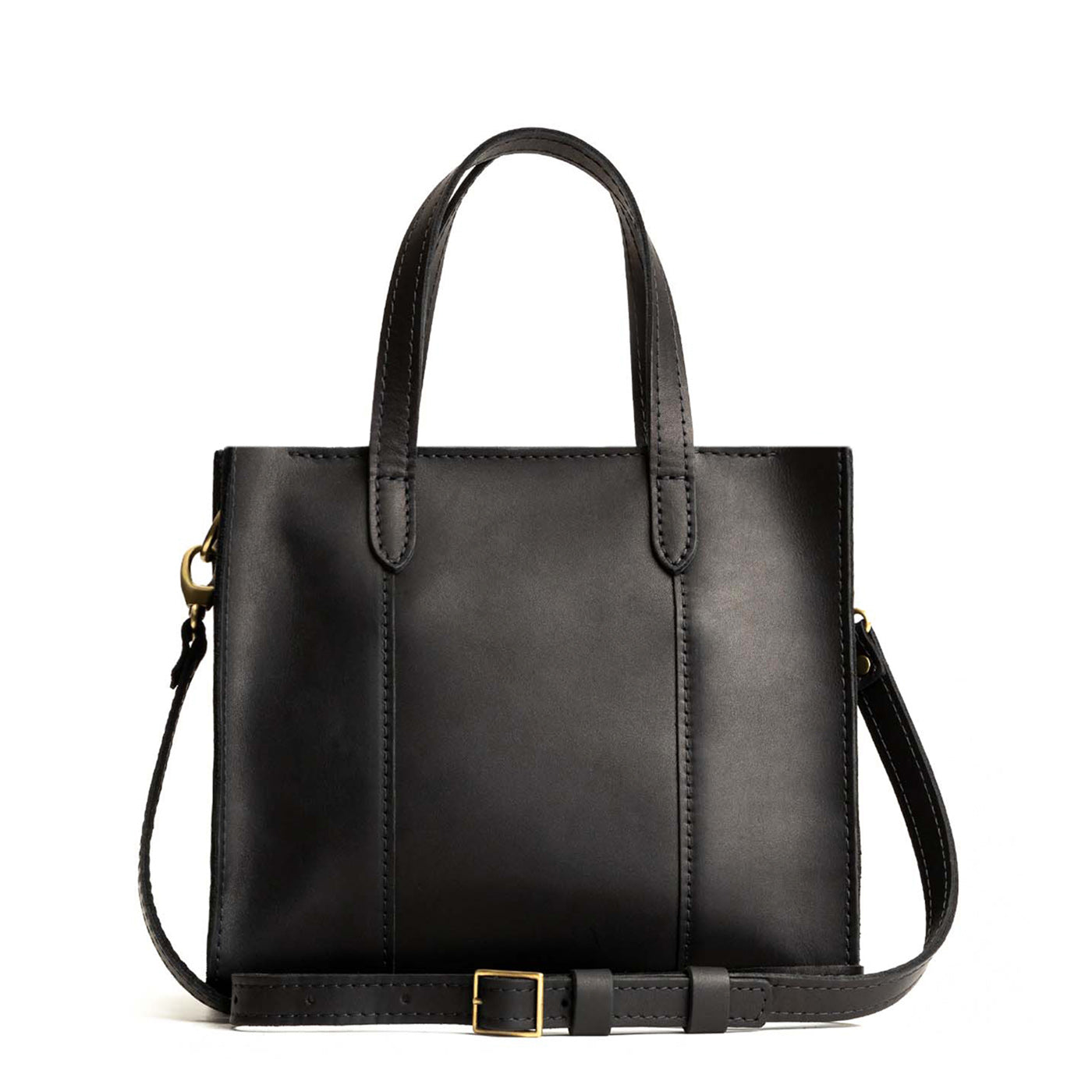 Black*Zipper | Structured mid-size tote bag with overlapping panels and crossbody strap