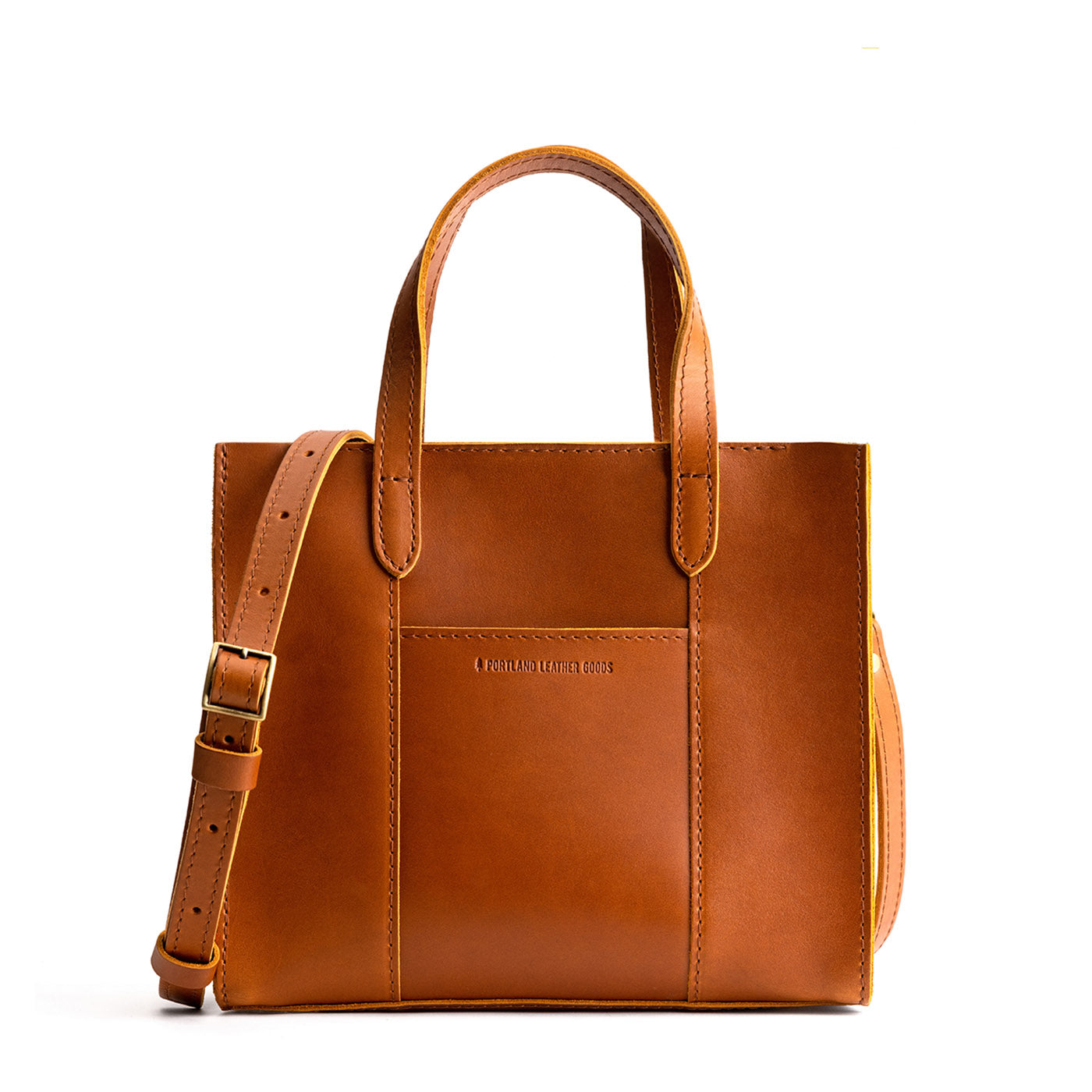 Honey*Zipper | Structured mid-size tote bag with overlapping panels and crossbody strap