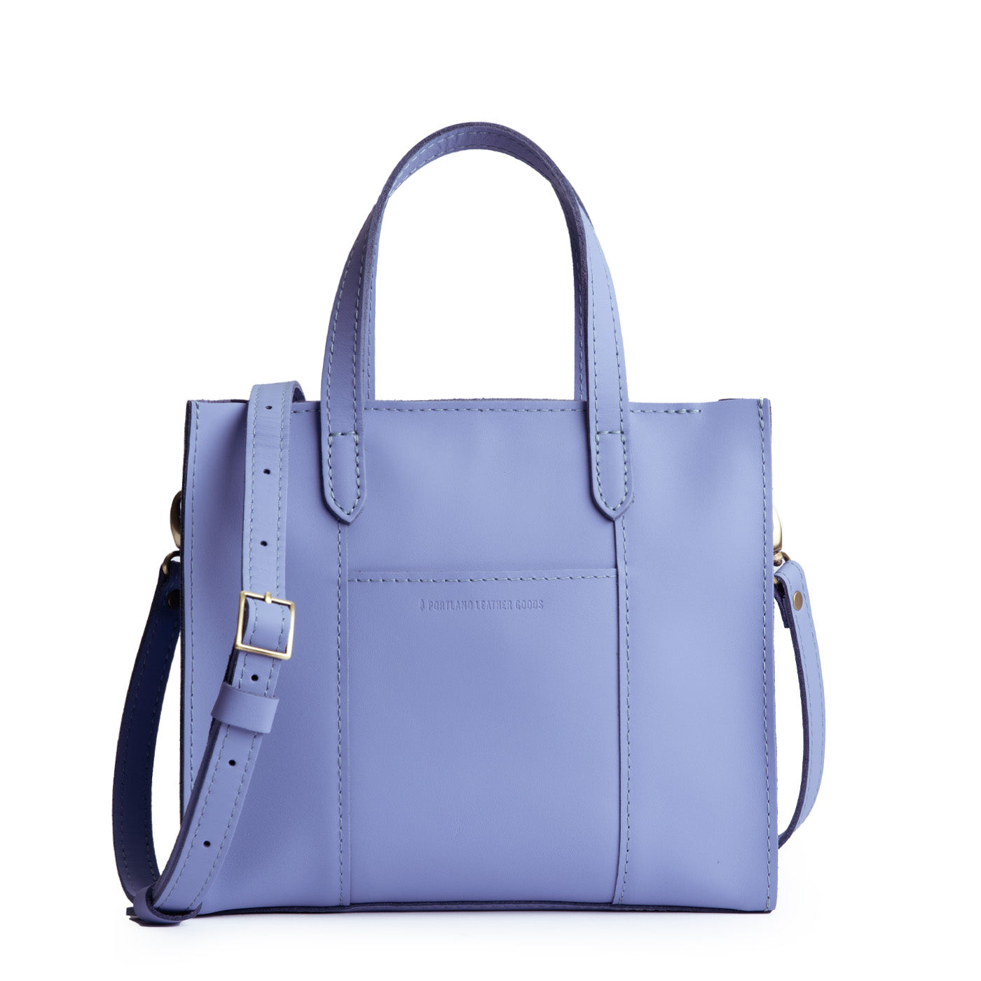 Jacaranda*Zipper | Structured mid-size tote bag with overlapping panels and crossbody strap