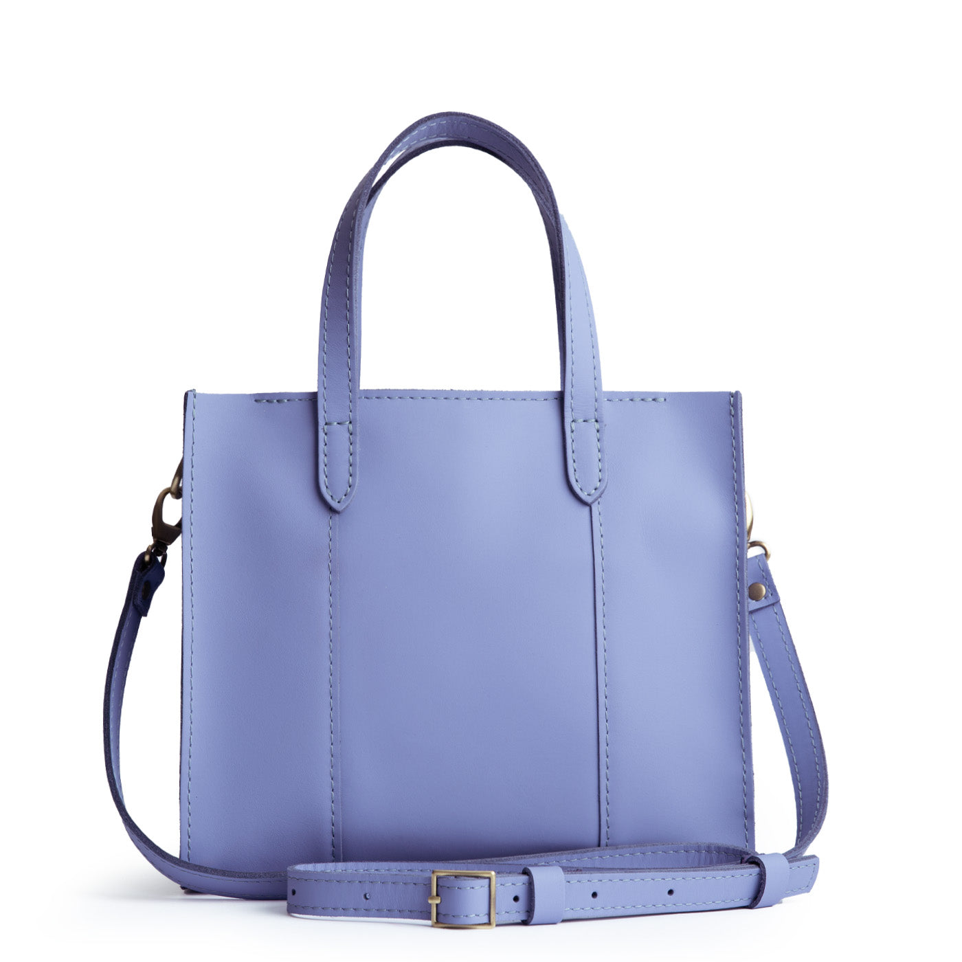 Jacaranda*Zipper | Structured mid-size tote bag with overlapping panels and crossbody strap