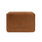 Biscotti | Backside of small leather wallet with debossed PLG logo