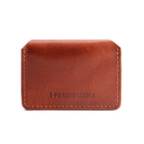 Chestnut | Small leather wallet with snap closure