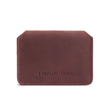 Merlot | Backside of small leather wallet with debossed PLG logo