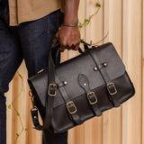  Black | Traditional messenger bag with multi buckle closure and crossbody strap