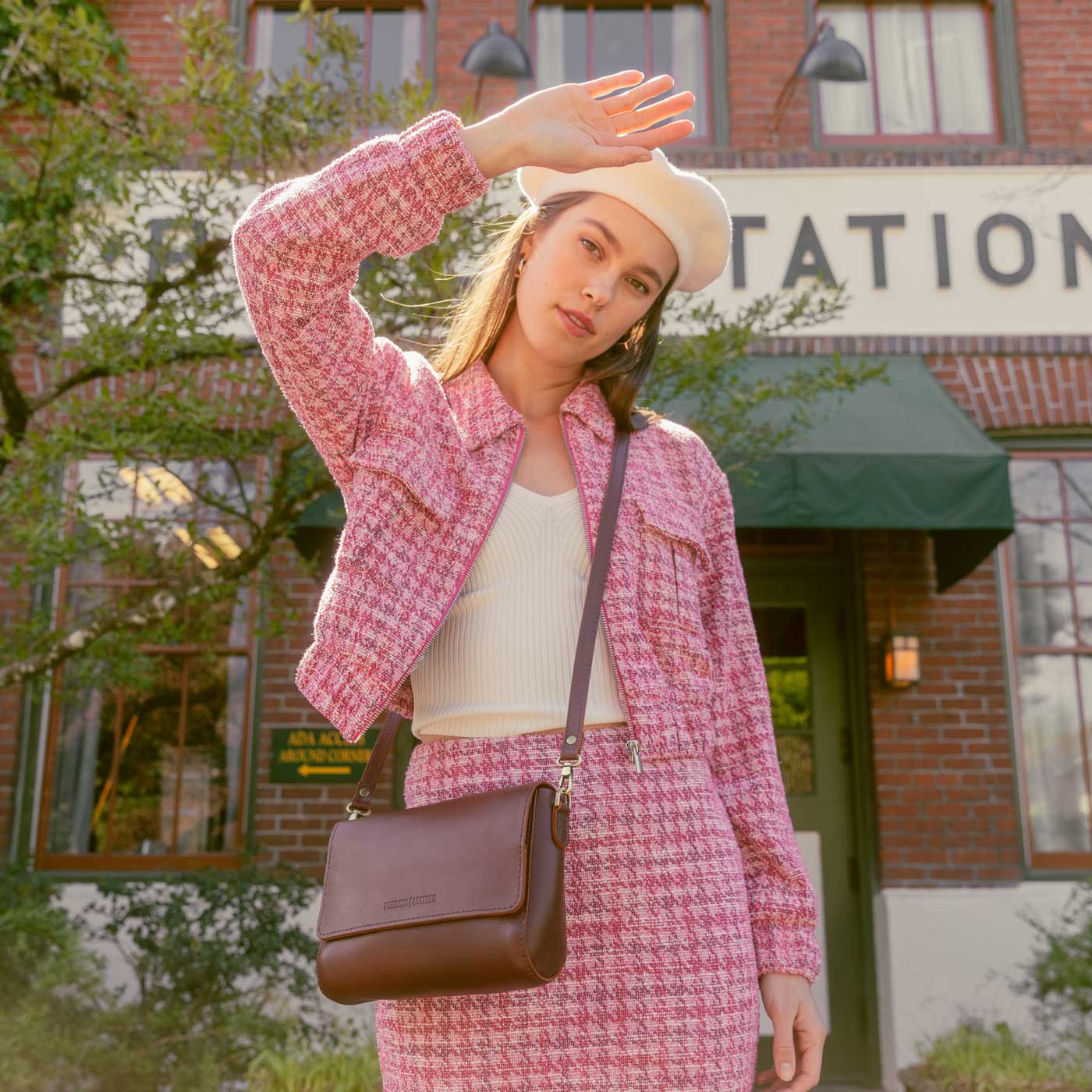 Cognac*Medium | Model Wearing Leather Crossbody Bag with Magnetic Messenger Bag Closure Outside